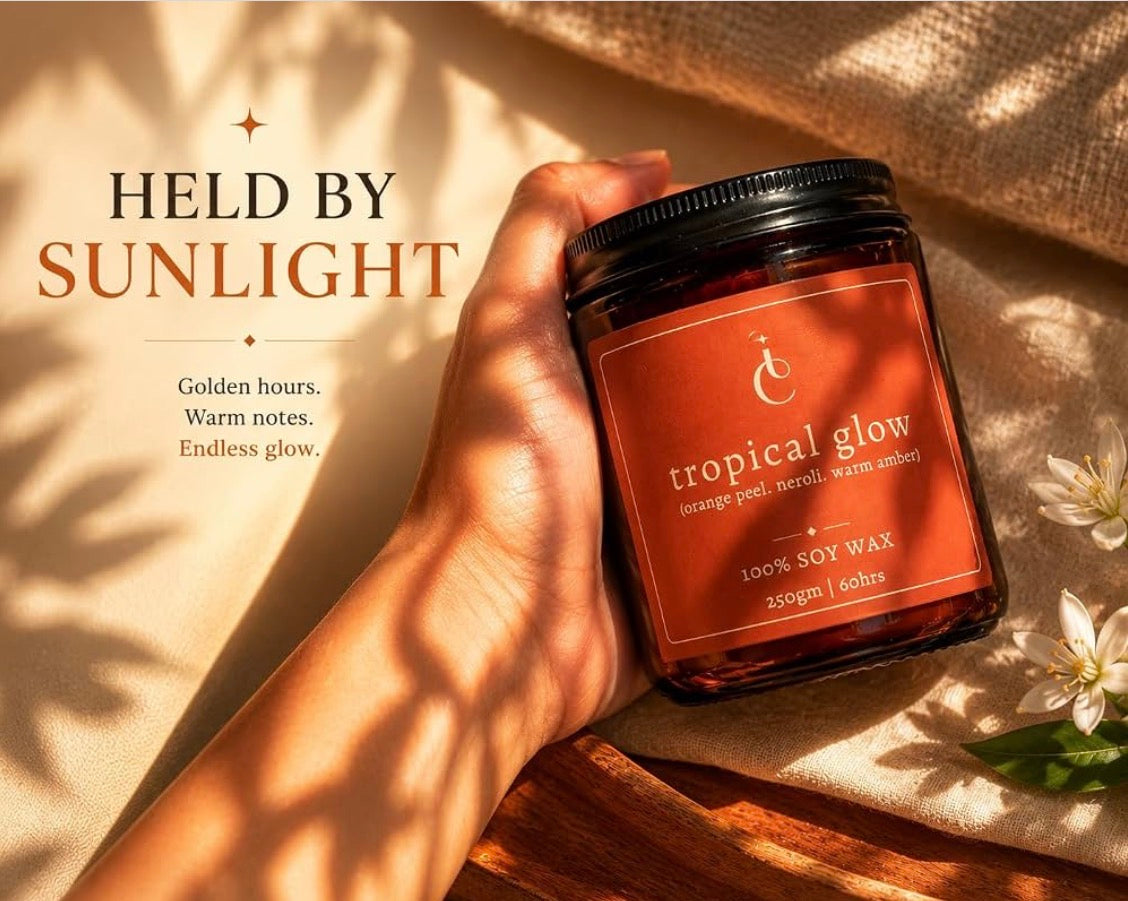 Tropical Glow candle with orange peel neroli and warm amber notes